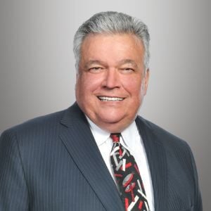 Headshot of retired attorney William Christopher